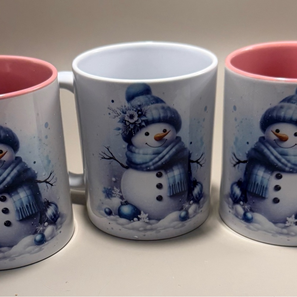Three Snowman Themed Pink and White Mugs